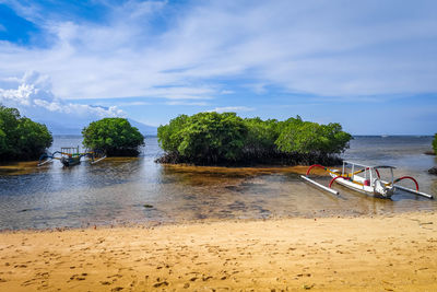 Scenic view of beach against sky