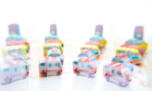Close-up of toys over white background