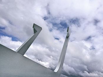 Low angle view of airplane against sky