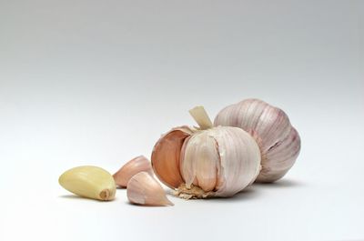 Close-up of pumpkins against white background