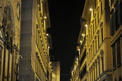 Low angle view of buildings at night