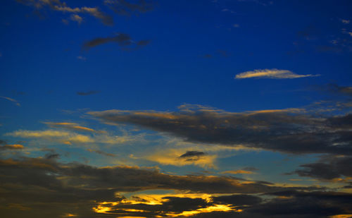 Low angle view of clouds in sky during sunset