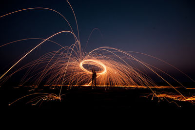 Full length of man with wire wool