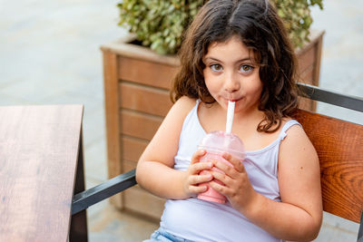 Portrait of a woman drinking drink