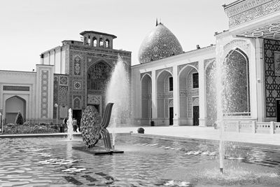 Fountain in front of building