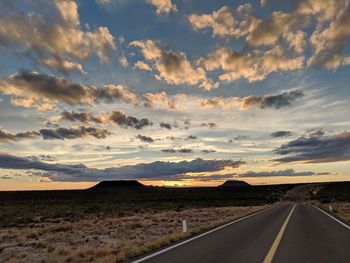 Road against sky during sunset