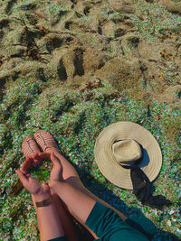 High angle view of woman holding umbrella