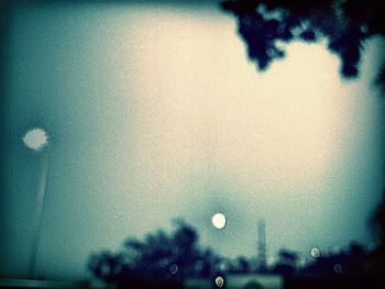 Low angle view of illuminated building against sky