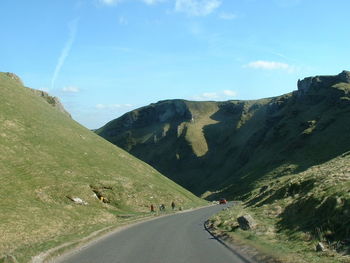 Scenic view of mountain road against sky