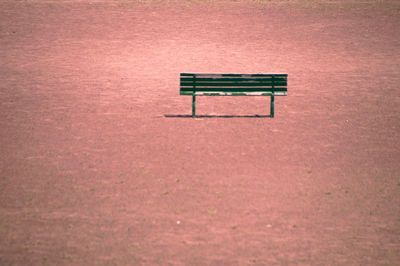 Empty bench in park