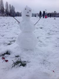 Scenic view of snow covered field