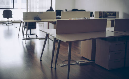 Close-up of desks in office