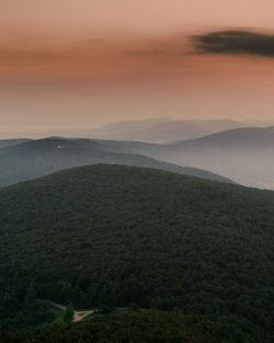 Scenic view of landscape against sky during sunset