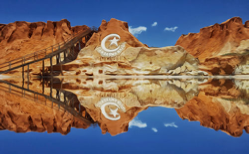 Reflection of rocks in water