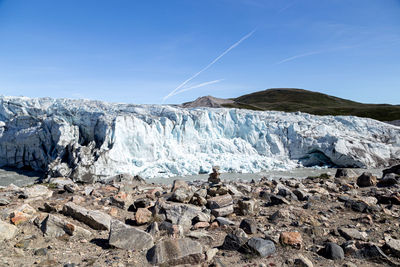 Scenic view of snowcapped mountains against clear blue sky