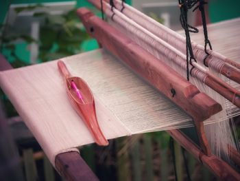 Close-up of pink umbrella on table