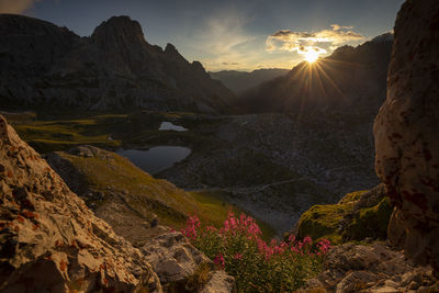 Scenic view of mountains against sky during sunset