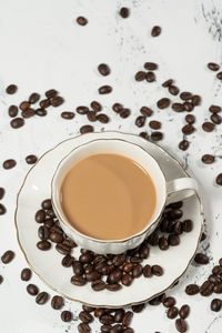 High angle view of coffee cup on table