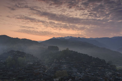 Scenic view of mountains against sky during sunset