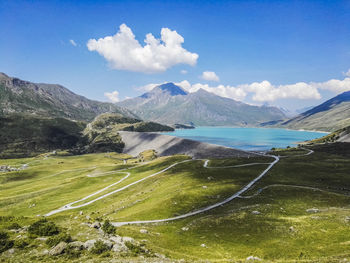 Scenic view of mountains against cloudy sky