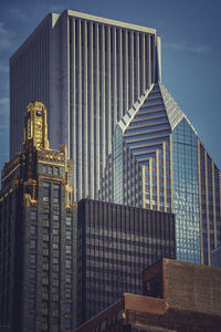 Low angle view of modern building against sky