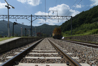 Railroad tracks against mountain