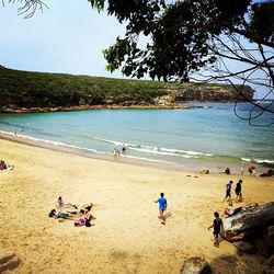 Tourists enjoying at beach