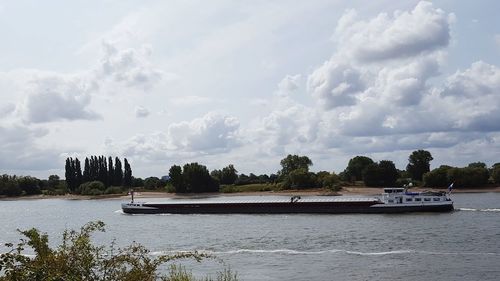 Scenic view of river against sky