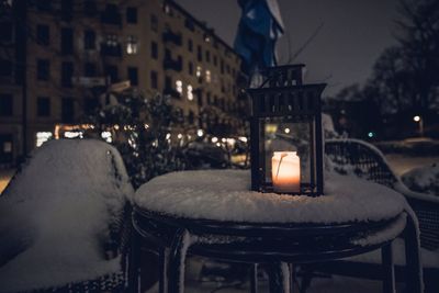 Close-up of illuminated lighting equipment at night