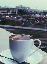 Close-up of coffee cup on table