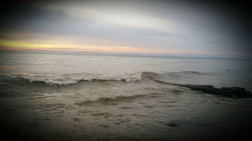 Scenic view of beach during sunset