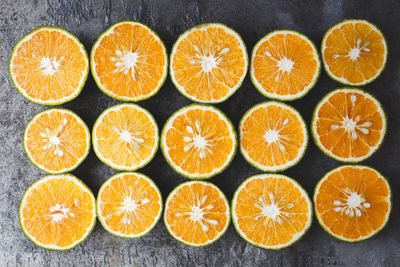 High angle view of orange fruits in row