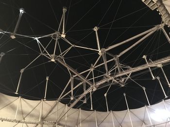 Low angle view of illuminated ferris wheel