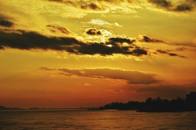 Scenic view of sea at sunset