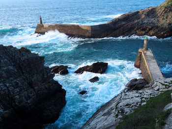 Scenic view of rocks in sea