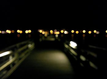 Illuminated street lights at night