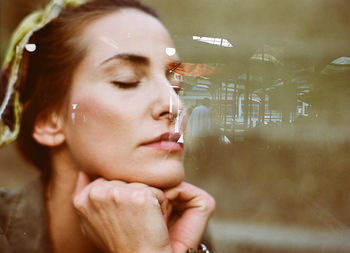 Portrait of young woman looking away