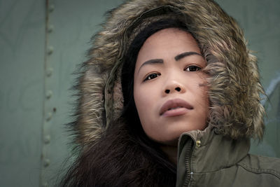 Portrait of young woman in winter