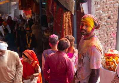 People standing on street in city