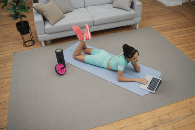 High angle view of boy playing with toys on table