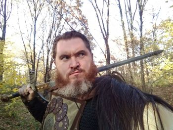 Portrait of senior man in forest