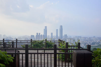 Modern buildings in city against sky