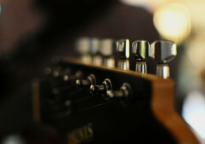 Close-up of guitar knobs