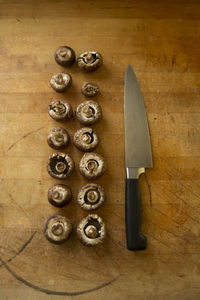 Close-up of coins on wood