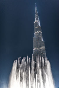 Low angle view of building against sky at night