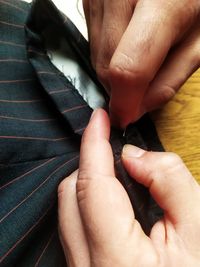 High angle view of people holding hands