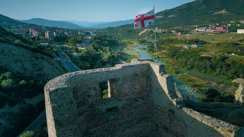 Scenic view of fort amidst buildings against sky