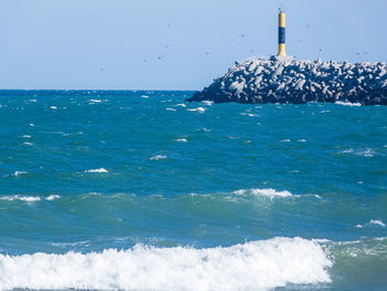 Scenic view of sea against clear sky