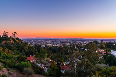 High angle view of townscape against sky during sunset