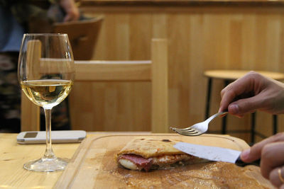 Midsection of person preparing food on table